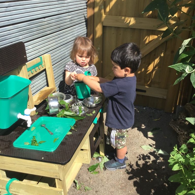 Children playing in the garden at Destiny Haven Nursery